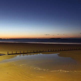 Tombée de la nuit sur la plage